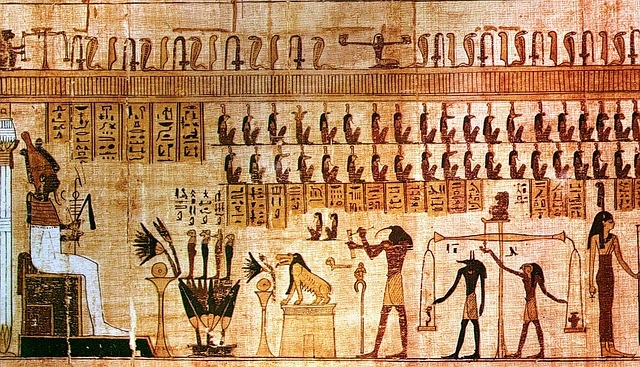 Ancient Egyptian hieroglyphs and historical carvings on a temple wall, representing Egypt's rich pharaonic heritage