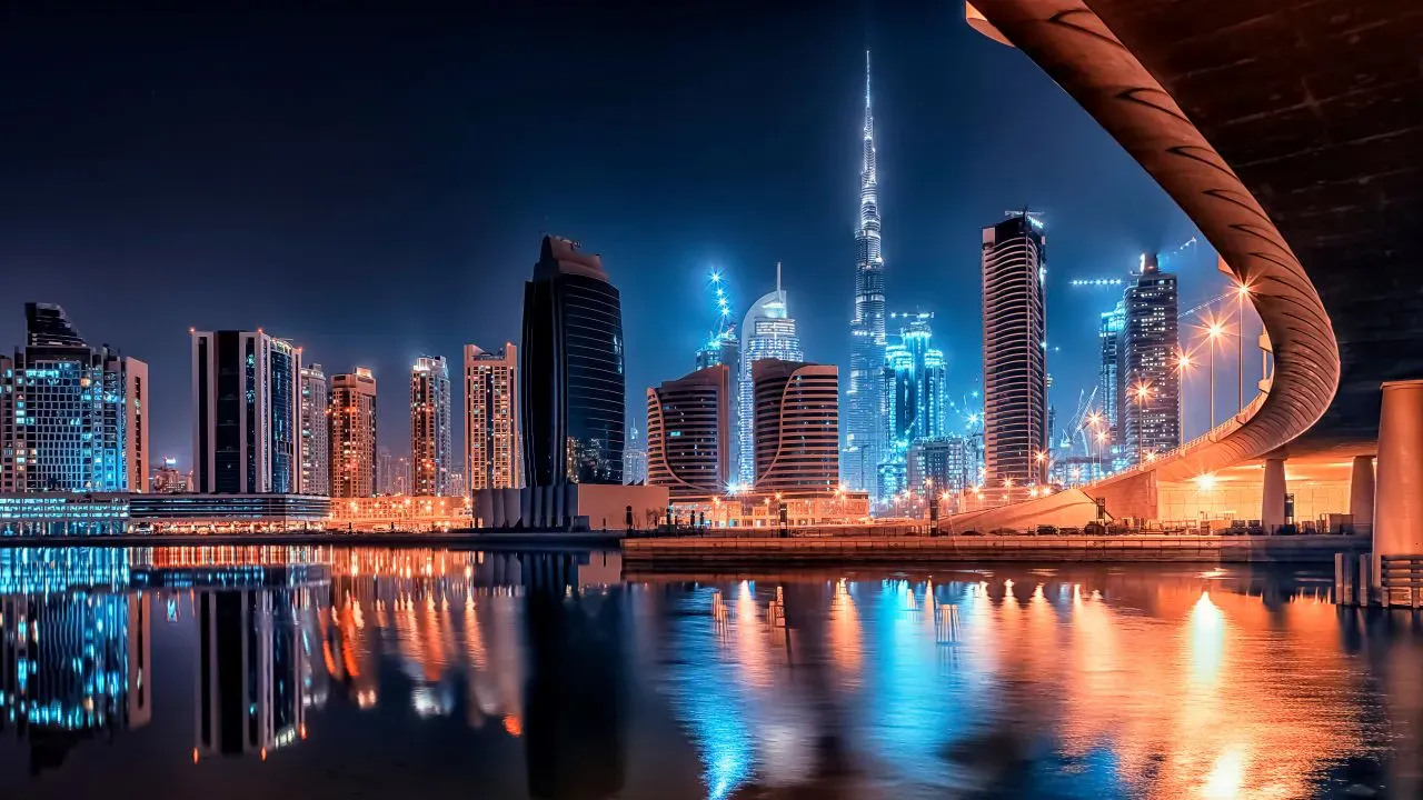Skyline of Dubai at night for a destination guide