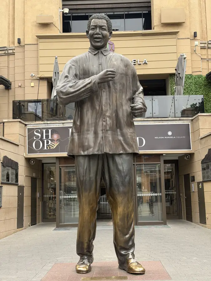 Large bronze statue of Nelson Mandela at Nelson Mandela Square; Sandton; Johannesburg — an eat-mea-2026 destination landmark.