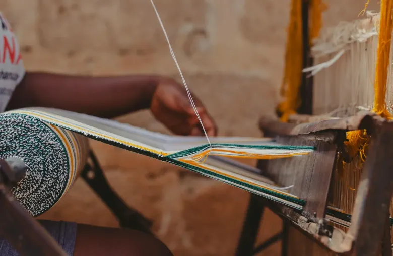 Kente cloth weaving, a traditional craft of the Akan people of Ghana