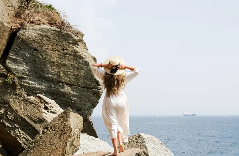 Woman at the Beach for a destination guide